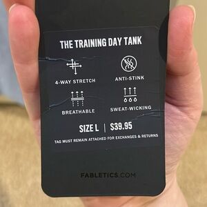 Men’s Fabletics blue tank.